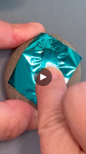 154K views · 3.6K reactions | Foil fish… 🐠🌈✨                #foil #glitter #shine #sparkle #fish #ocean #beach #paintedrocks #pebbles #crafty #oddlysatisfying #satisfying #asmr #artsupplies #becreative #process #paint #art #goodvibes | Kala Escobar Design | Mark Knopfler · Cannibals Rock Weaving, Foil Fish, Fish Rocks, Fish Ocean, Deco Foil, Mark Knopfler, 2025 Calendar, Paint Rock, Glitter Paint