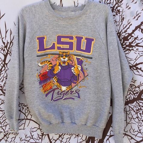 Vintage Ncaa Louisiana Football Sweatshirt, Lsu Tigers Shirt, Louisiana State University Shirt, Ncaa Shirt, Unisex Shirt, Vintage Shirt Product Details: - 8 Oz; 50% Cotton/50% Polyester - Air Jet Yarn For A Softer Feel And No Pilling - 1x1 Athletic Rib Cuffs And Waistband With Spandex; Double-Needle Stitching - Decoration Type: Digital Print - Other Colors And Styles Are Available By Request -Care Instructions-- Wash Item Inside Out In Cold Water, Do Not Bleach, Do Not Dry Clean, Do Not Iron Dir Lsu Sweatshirt, Lsu Shirt, Tigers Shirt, University Shirt, Tiger Shirt, Louisiana State University, Football Sweatshirt, Louisiana State, Tiger T Shirt