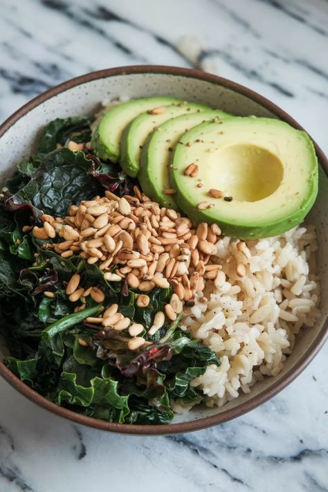 A photo of a  Charred Greens & Brown Rice Nourish Bowl a Winter Nourish Bowl Winter Nourish Bowl, January Refresh, Recipes For Winter, Nourish Bowls, Nourish Bowl, Healthy Bowl, Healthy Bowls, Vegan Options, Satisfying Food