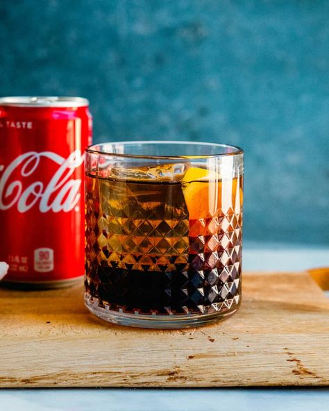 Here's how to make Crown and Coke: one of the easiest Crown Royal cocktails there is! Here's the ratio to use and a few tricks to step it up. #crownandcoke #crown #crownroyal #crownroyalcocktails Crown Cocktails, Crown And Coke, Gin And Coke, Coke Cocktails, Royal Cocktails, Drinks Coke, How To Make Crown, Make Crown, Friday Cocktails