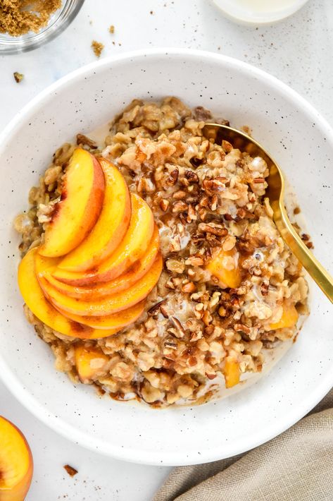 This classic Peaches and Cream Oatmeal is hearty and delicious, made with rolled oats, fresh peaches, and a brown sugar drizzle. Stovetop and Instant Pot directions are included for this meal prep and vegan friendly breakfast! ProjectMealPlan.com Peaches And Cream Oatmeal, Peach Oatmeal, Instant Oats, Cinnamon Oatmeal, Fresh Peaches, Peaches And Cream, Meal Prep Containers, Peaches Cream, Peaches N Cream