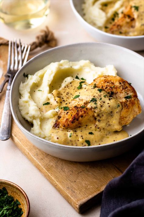 Chicken breasts smothered in the most insanely delicious dijon mustard cream sauce served over fluffy mashed potatoes. The chicken and sauce are all made in one skillet, making it an easy dinner. #creamsauce #dijonsauce #dijonmustard #skilletchicken #valentinesdaydinner #easydinner Chicken And Mashed Potatoes, Easy Chicken Breast, With Mashed Potatoes, Chicken Breast Recipes, Easy Chicken, Dijon, Chicken Dinner, Chicken Dishes, Chicken Breast