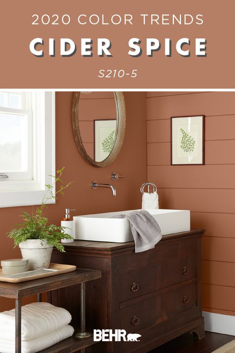 Snuggle up to the warm and cozy hue of BEHR® Paint in Cider Spice from the 2020 Color Trends Palette. A soft shade of red with brown undertones, this paint color is the perfect complement to the rich wood tones in this rustic bathroom. Click below for full color details to learn more. Brown Paint Colors, Warm Bathroom, Bathroom Niche, Behr Paint Colors, Primitive Homes, Behr Paint, Bathroom Paint Colors, Shade Of Red, Casa Exterior