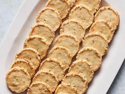 Blue Cheese and Walnut Crackers Recipe | Ina Garten | Food Network Blue Cheese Crackers, Roasted Shrimp Cocktail, Cheese Wafers, Cheese Logs, Cheese Spreads, Cheesy Appetizer, Thanksgiving Entertaining, Crackers Recipe, Fall Soup