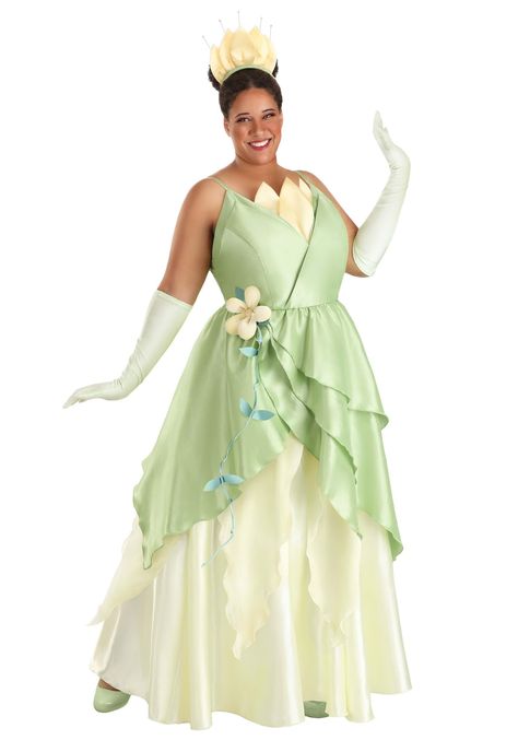 PRICES MAY VARY. Enchanting Tiana Costume: Step into the magical world of Disney with this plus-size Princess and the Frog Tiana costume, featuring a luxurious green dress, matching gloves, and a sparkling headband for an unforgettable royal look. Quality Materials: Crafted from 100% polyester, the dress features dupioni fabric for the bodice and straps, soft yellow organza petal layers, and green satin petals, all designed to recreate Tiana's iconic look with added comfort. Perfect Fit & Adjust Plus Size Disney Princess, Elegant Green Dress, Toddler Elsa Costume, Princess Tiana Costume, Elegant Green Dresses, Disney Princess And The Frog, Tiana Costume, Frog Dress, Disney Dapper Day