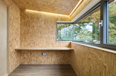 OSB Panels in Interiors: From a Humble Material to a Design Feature | ArchDaily Osb Storage, Osb Walls, Wellbeing Studio, Osb Furniture, Osb Plywood, Gable Roof House, Strand Board, Osb Board, Tropical House Design