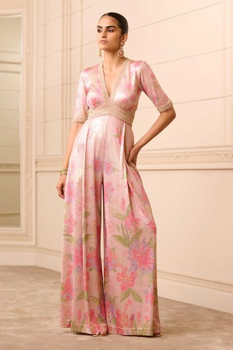 Shop for these amazing collections of Purple Foil Jersey Print Floral V Neck Jumpsuit For Women by Tarun Tahiliani online at Aza Fashions. Indian Style Jumpsuit, Jumpsuits For Women Indian Wedding, Printed Indo Western Outfits, Floral Indo Western Outfits, Jumpsuit Traditional Indian, Ethnic Jumpsuits For Women, Desi Jumpsuit, Indo Western Wedding Outfits Women, Indo Western Outfits For Women Wedding