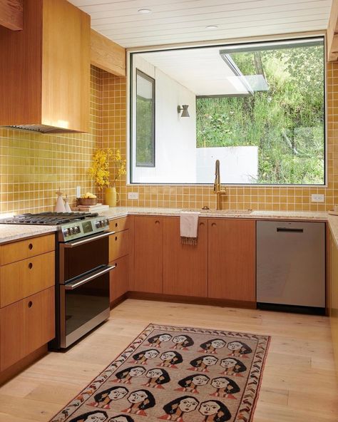 yellow everything > 🌻🌻 // loving this yellow monochromatic mid century kitchen 〰️ our pacifica alabaster large yellow + medium yellow… | Instagram Kitchen Mebel, Mid Century Wood Kitchen, Yellow Tile Kitchen, Yellow Kitchen Tiles, Yellow Backsplash, Concrete Collaborative, Mcm Kitchen, Basement Kitchen, Backsplash Tiles