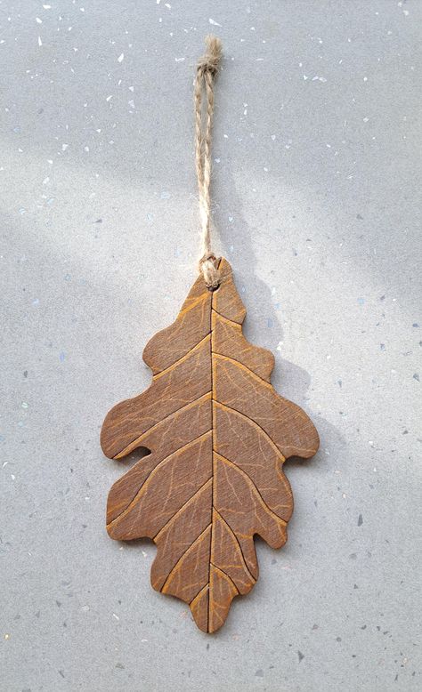 A hand decorated wooden hanging decoration with a shimmer varnish. Can be used for decorative purposes, on your Christmas tree, or used on wrapped presents as an extra special gift tag. Wrapped Presents, Leaf Decoration, Leaf Decor, Oak Leaf, Hand Decorated, Gift Tag, Special Gift, Hanging Decor, Ornament Decor