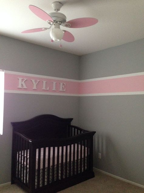 We finished Kylie's nursery! Got the stripe idea from another pin and so in love with how it turned out! Pink and gray nursery. Baby girl nursery. #nursery Pink And Purple Striped Walls, Pink And Grey Painted Walls, Purple Nursery Girl, Koala Nursery, Striped Nursery, Pink And Gray Nursery