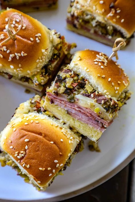 Muffuletta Sliders Muffuletta Sliders, Muffaletta Olive Salad Recipe, Sandwich Sliders, Muffaletta Sandwich, Roll Sliders, Muffuletta Sandwich, Hawaiian Roll Sliders, Hawaiian Roll, Slider Sandwiches