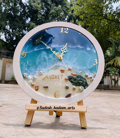 PERSONALISED OCEAN RESIN WALL CLOCK…😍 . Product Size - 14 inches . DM @Sudesh_kadam_arts for more details..😎 This unique and creative gift captures the essence of a peaceful beach and is perfect for remembering special moments with your loved one. You can personalize it with your names and date, making it a perfect gift to show your love and appreciation, this wall piece is sure to be cherished for years to come. Best For- Gifting, Birthdays, Interior Decorators Room Type- Bedroom, Living ... Peaceful Beach, Resin Wall Clock, Ocean Resin, Wall Piece, Room Type, Special Moments, Creative Gifts, Wall Clock, Interior Decorating