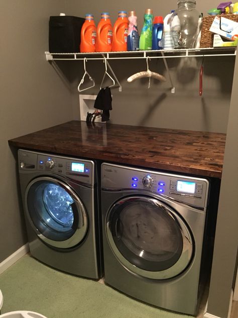 Just finished installing our new Whirlpool Front load washer and dryer with a beautiful hand stained butcher block counter top! Countertop Washer, Laundry Room Folding Table, Closet Upgrade, Landry Room, Laundry Room Countertop, Laundry Room Storage Shelves, Vintage Laundry Room, Small Laundry Room Organization, Room Storage Diy