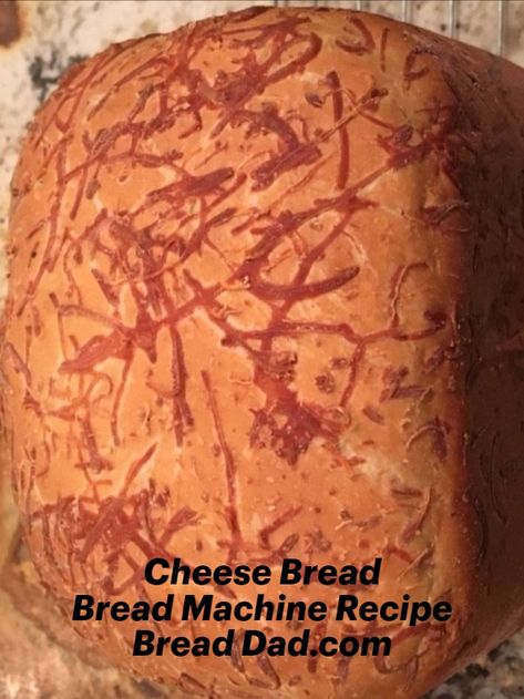 This bread machine cheese bread recipe is simple to make and is quite delicious. It also looks great. I don’t know much about art… but this cheese bread loaf looks almost like a crazy Jackson Pollock painting! Join Bread Dad's email newsletter for more easy recipes - http://eepurl.com/gPY50r #CheeseBreadRecipe #BreadMachineCheeseBread #CheeseBreadMachineRecipe #CheeseBreadRecipes #EasyCheeseBread Bread Dad Recipes, Cheddar Cheese Bread Machine Recipes, Cheese Bread Bread Machine, Bread Machine Cheese Bread, Cheese Bread Machine Recipes, Bread Machine Cheese Bread Recipes, Bread Machine Recipes Easy Simple, Bread Machine Recipes Healthy, Bread Machine Recipes Sweet