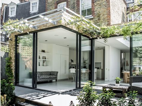 Kitchen extension design with glass sliding doors creates light filled family kitchen glass box.  Charles Barclay Architects Extension Veranda, Minimal Windows, Terrasse Design, Room Extensions, Contemporary Patio, Glass Extension, House Extension Design, Rear Extension, Glass Walls