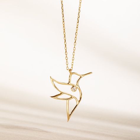 Diamond Hummingbird Pendant Necklace, 14k 18k Solid Gold Dainty Hummingbird Necklace, Tweety Bird Jewelry, Bird Lover Necklace Gift For Her Material: Solid Gold (real gold, not gold plated or gold filled material) Available Gold Karat: 14K (585), and 18K (750)  Pendant Width:  1.40 cm (0.55 inches) Pendant Height:  1.85 cm (0.72 inches) Available Gold Colors: Yellow gold, rose gold and white gold (optional) Available chain width: 0.72 mm (Type #2), 0.84 mm (Type #3) Diamond weight: 0.01 ct  Diam Diamond Bird Jewelry, Humming Bird Necklace, Gold Bird Necklace, Infinity Rings, Hummingbird Jewelry, Lover Necklace, Hummingbird Necklace, Fancy Jewelry Necklace, Hummingbird Pendant