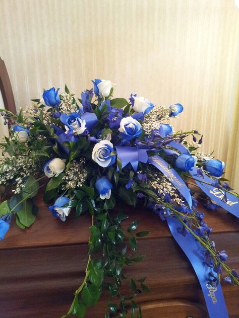 Blue and white roses. Casket spray. Flowers. Photo of funeral flowers. Remembrance Flowers, Cemetery Arrangements, Blue And White Roses, Casket Flowers, Casket Spray, Grave Flowers, Casket Sprays, Cemetery Decorations, Flowers Unique