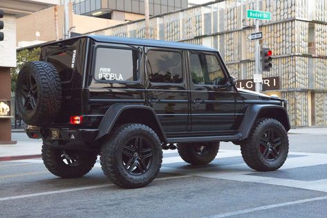 Black Mercedes Gwagon with lift and offroad tires. Offroad Tibus portal axles lift and 37 inch wheels on a luxury black Mercedes G Wagon 4x4 Squared conversion by Pit26 - Here's why it's the only right way to lift G55 and G63 AMG without breaking the suspension geometry. #mercedes #gwagon #offroad #liftedtruck #luxurycar G Wagon 4x4 Squared, G Wagon 4x4, Mercedes Jeep, Black Mercedes, Portal Axles, Mercedes G Wagon, Gear Reduction, Mercedes Benz G Class, Overland Vehicles