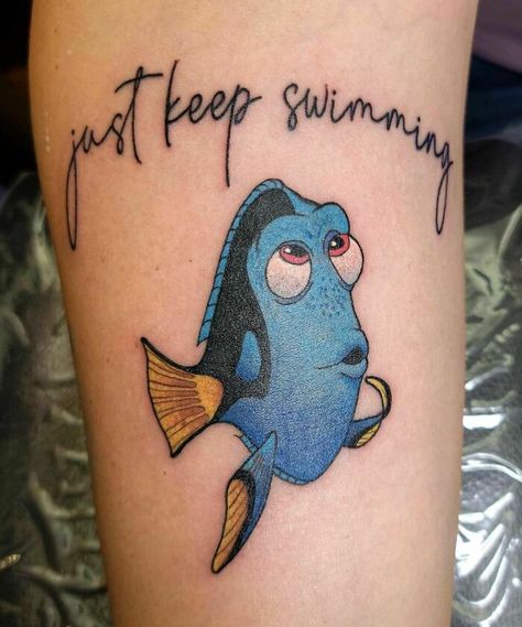 Dory tattoo Tattoo Art Drawings Design Beautiful, Dory Fish Tattoo, Dorey The Fish Tattoo, Dory Tattoo Ideas, Dory Tattoo Small Black And White, Dora Tattoo, Finding Dory Tattoo, Finding Nemo Tattoos, Nemo And Dory Tattoos