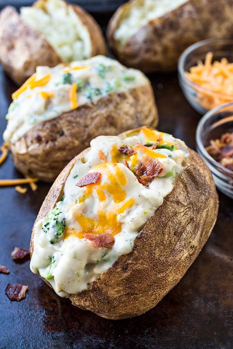 These stuffed potatoes with chicken and broccoli sauce are a creamy and decadently savory meal prepared with just a few simple ingredients! | thecozyapron.com #stuffedpotatoes #stuffedbakedpotatoes #stuffedpotatoesrecipe #stuffedbakedpotatoesrecipe #stuffedpotatoeshealthy #stuffedbakedpotatoeshealthy #stuffedpotatoeseasy Creamy Chicken And Broccoli, Creamy Chicken Broccoli, Stuffed Baked Potato, Chicken Broccoli Bake, Stomach Rumbling, Potatoes Baked, Stuffed Potatoes, Stuffed Baked Potatoes, Broccoli Bake