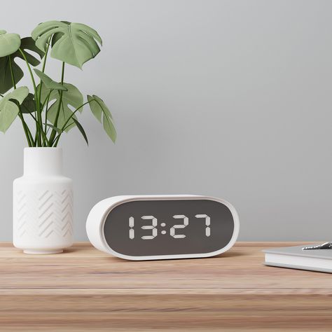 Designed in a clean, modern style, the Visor alarm clock from Jones is finished in a crisp, white colourway. Boasting a minimalist style, this capsule-shaped alarm clock features a bold, digital LED display, offering both 12 and 24 hour formats, as well as temperature display and night mode functions with automatic dimming. Minimalist Alarm Clock, White Clock, College Decor, Night Mode, White Clocks, Kitchen Clocks, Wall Kitchen, Redecorate Bedroom