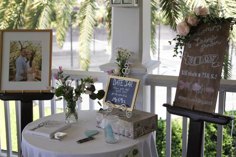 Bridal shower entryway/sign in table with date night jar, welcome sign, and engagement photo. https://www.youtube.com/user/Basilchic23 Bridal Shower Welcome Table, Sign In Table Ideas, Bridal Shower Sign In, Garden Bridal Shower Themes, Simple Bridal Shower Decorations, Night Jar, Fiesta Shower, Bridal Shower Decoration, Disney Bridal Showers