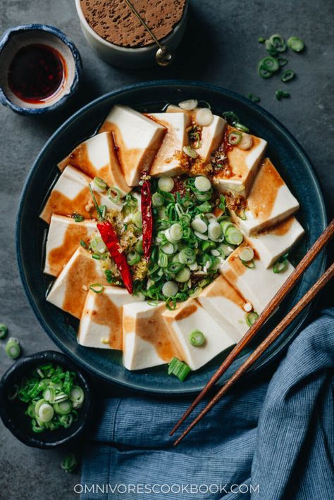 Silky tender tofu is steamed then drizzled with a fragrant aromatic oil and a rich sauce that is savory and sweet. It’s a beautiful hot appetizer that is simple and surprisingly satisfying. Serve it as a light meal with steamed rice or as part of a multi-course dinner. {Vegetarian, Vegan, Gluten-Free Adaptable} Vegetarian Oyster Sauce, Cantonese Food, Cantonese Cuisine, Hot Appetizers, Authentic Chinese Recipes, Steamed Tofu, Tofu Dishes, Cooking Courses, Easy Chinese Recipes