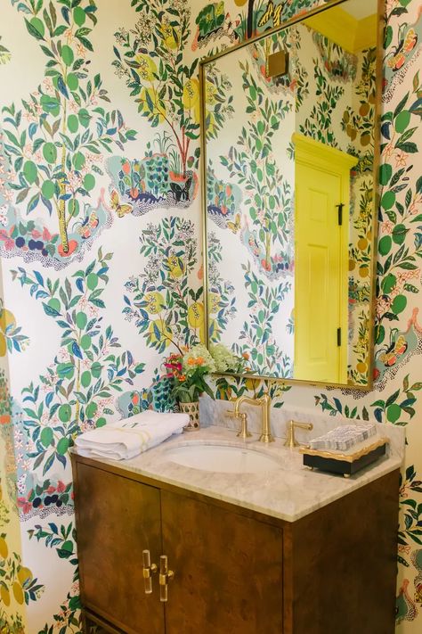 Bathroom Maximalist, Sunny Bathroom, Maximalist Bathroom, Vibrant Wallpaper, Art Deco Lights, Black Subway Tiles, Floating Sink, Maximalist Design, Vibrant Wall Art