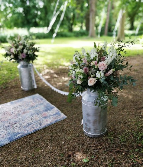 Wedding decor flowery milk churns Milk Cans Wedding Decor, Milk Can Decor Wedding, Milk Bottle Flower Arrangements, Milk Bottle Flowers, Metal Milk Jug, Milk Can Decor, Country Wedding Pictures, Milk Churn, Floral Arrangements Wedding