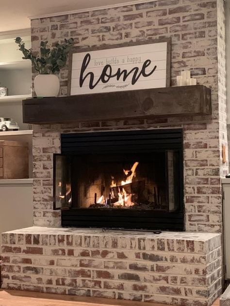 Distressed Fireplace Brick, Dark Brick Fireplace Decor, Modern Rustic Fireplace Decor, Diy Painted Brick Fireplace, Wooden Mantle On Brick Fireplace, White Farmhouse Fireplace, Farmhouse Brick Interior, Living Room Fireplace Ideas Farmhouse, Brick Fireplace Decor Ideas Living Rooms