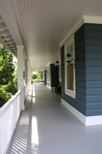 traditional porch by Rugo/ Raff Ltd. Architects, blue siding, white trim, grey floor via houzz Craftsman Light Fixtures, Light Blue Houses, White House Interior, Blue Siding, White Porch, Traditional Porch, Porch Design Ideas, Porch Ceiling, Building A Porch