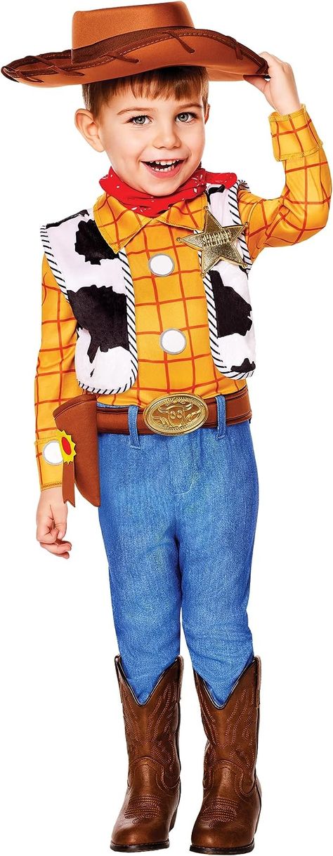 When trying to decide between two sizes, choose the larger size for a better fit. Howdy partner! If your child is a fan of all things Toy Story, then they’re going to love dressing in this officially licensed Woody costume for Halloween! This costume includes a jumpsuit with an attached belt and hat. It’s made from polyester, cotton, and plastic materials for an easy and comfortable fit. Take extra caution when cleaning this product to avoid wear and tear. Always be sure to spot clean to prolong Disney Group Costumes, Halloween Toy Story, Halloween Baby Toys, Cowboy Cosplay, Halloween Spirit Store, Woody Costume, Buzz Lightyear Costume, Halloween Products, Toy Story Characters