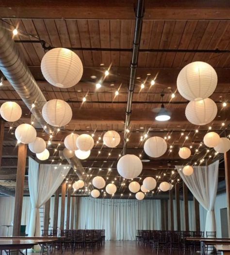 Paper Lanterns Wedding Reception, Lights And Lanterns Party, Paper Lanterns Ceiling, Paper Lantern Hanging Ideas, Ceiling Lantern Lights, Wedding Lanterns Hanging, Paper Lantern Ceiling Decor, Lanterns Hanging From Ceiling, Paper Lanterns Wedding Decor