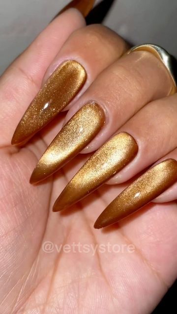 Bronze Cat Eye Nails, Amber Jelly Nails, Black And Gold Cat Eye Nails, Yellow Cateye Nails, Gold Cateye Nails, Brown Cateye Nail, Yellow Cat Eye Nails, Orange Cat Eye Nails, Brown Jelly Nails