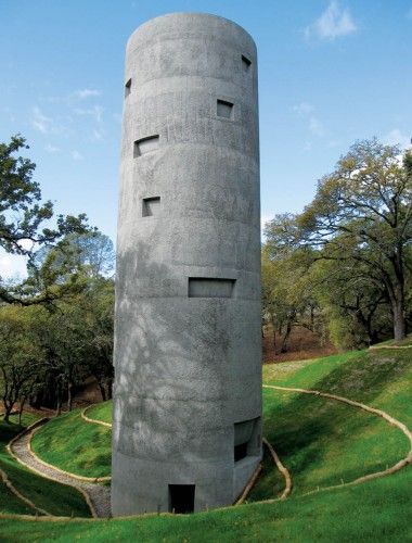 Ann Hamilton Tower - 'artwork' at the Oliver Ranch in Geyserville, CA; double helix stairs allow for performers on one stair and audience on the other, letting the two intertwine but never come into direct contact as the stairs wind up the 24 foot diameter tower; several stories tall with seating and light niches cut into the thick concrete walls; open at the top, the sky is reflected in a pool at the base of the tower; designed by Jensen Architects; photo by Richard Barnes Ann Hamilton, Round Tower, Unusual Buildings, Tower Building, Artistic Installation, Concrete House, Amazing Buildings, Structure Architecture, Watch Tower