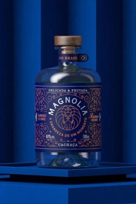 Marcelo Andrade's packaging design for Magnolia Cachaça showcases a rich and stunning dark blue label that effortlessly coordinates with the subtle brown and white details. Dark Blue Packaging, Liquor Packaging, Blue Packaging, Drinks Brands, Blue Food, White Details, Blue Label, Packaging Design Inspiration, Food Packaging