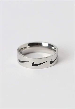 Nike Swoosh Repeat Logo Stainless Steel Ring Silver | Joe's Jewellery | ASOS Marketplace Nike Rings Silver, Rings Nike, Cute Rings Silver, Nike Ring, Nike Jewelry, Accesorios Aesthetic, Nike Clothes, Grunge Jewelry, Rings Women