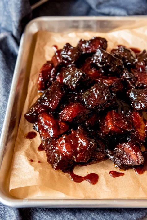 Smoked Pork Belly Burnt Ends are irresistible, juicy bites of mouthwatering meat (the same kind used to make bacon) that is rubbed in spices, infused with smoky flavor, and tossed in a fabulous barbecue sauce.  Eat them as an appetizer by spearing with toothpicks, or throw them into tacos or salads, onto buns for pork belly sandwiches, or over nachos.  #porkbelly #pork #burntends #appetizer #bbq #barbecue #smoker #easy #recipe #meat #grilling Bbq Pork Bites, Burned Ends Bbq, Oven Baked Pork Belly Burnt Ends, Pork Belly Burnt Ends In The Oven, Pork Belly Sauce, Burnt Ends In The Oven, Pork Burnt Ends, Smoked Pork Belly, Brisket Burnt Ends