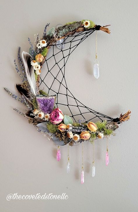 Dried flowers, wreath, Crescent Moon, crystals. Available now at www.thecovetedstonellc.com Crystal Wreath Ideas, How To Make A Moon Wreath, Ostara Wreath Diy, Crescent Moon Craft, Moon Wreaths Diy, Witchy Crescent Moon Wreath Diy, Moon Shaped Wreath, Diy Crescent Moon Wreath, Cresent Moon Wreaths