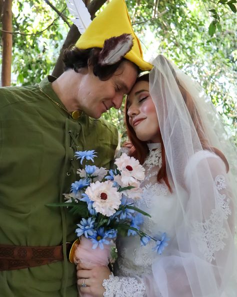 I wish it would never end 🍃❤️🦊 Part 4 of my Disney Wedding dress series ✨👰🏼‍♀️✨ Maid Marian and Robin Hood 💕 with my fiancée @ryanmyers007 I was so excited to recreate this wedding scene from Robin Hood! As always you can see more in depth of making this series on my TikTok ! Only one more wedding dress to go before I reveal my real wedding dress!! ✨ 📸: @critiquegeek Robin Hood And Maid Marian Fanart, Robin Hood And Maid Marian, Disney Wedding Dress, Maid Marian, Disney Wedding Dresses, Wedding Scene, Always You, Disney Wedding, Robin Hood