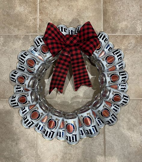 Beer Can Centerpieces Table Decorations, Beer Can Wreath Diy, Beer Themed Christmas Decorations, How To Wrap Beer Cans Gift Ideas, Beer Can Christmas Ornaments, Beer Can Ornaments Diy, Beer Can Gift Ideas, Beer Can Decor, Brewery Christmas Decorations