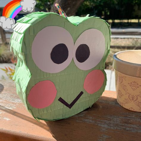 Sanrio Pinata, Keroppi Birthday Party Ideas, Pinata Aesthetic, Piñata Aesthetic, Keroppi Birthday, Hello Kitty Pinata, Frog Party Ideas, Homemade Pinata, Slime Birthday