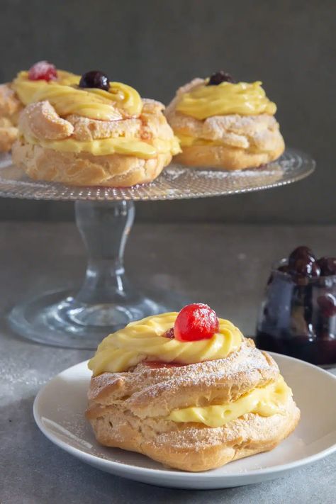 Zeppole di San Giuseppe Recipe - An Italian in my Kitchen Zeppoli Recipe, Italian Pastry Cream, Zeppole Recipe, Italian Baking, Puff Dessert, Easy Homemade Cookies, Pastry Cream Filling, Black Cherries, Italian Pastry