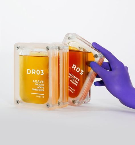 futuristic honey packaging by culdesac draws from kubrick's '2001: a space odyssey' Honey Packaging, Bottle Design Packaging, Cool Packaging, Ring Der O, Botol Air, Food Packaging Design, Packing Design, Beverage Packaging, Creative Packaging Design