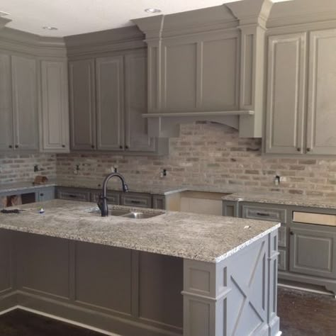 Love the brick backsplash color against the grey cabinets Cost Of Kitchen Cabinets, Brick Backsplash Kitchen, Budget Kitchen Remodel, Brick Kitchen, Brick Backsplash, Gray Cabinets, Bedroom Light Fixtures, Bedroom Remodel, New Kitchen Cabinets