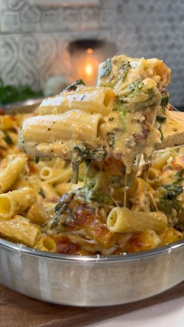 Eat For Cheap on Instagram: "CREAMY PESTO CHICKEN & BROCCOLI PASTA BAKE 🔥 (credit: @heresyourbite) SMASH OR PASS?!

Send this to someone who should make this! Full recipe below:

INGREDIENTS

1lb pasta of choice
1/3 cup sun-dried tomatoes + oil
1lb chicken 
1 tbsp butter
1/2 yellow onion, diced
Salt and pepper, to taste
Paprika, to taste
Oregano, to taste
@tonychacheres , to taste
1 head of garlic, minced (or to taste)
2 cups heavy cream
1-2 cups cooked broccoli, to taste
2 handfuls spinach
2 cups freshly shredded parmesan cheese
2 cups shredded mozzarella
1/2 cup pesto, to taste
Parsley to garnish

STEPS

1. Preheat oven to 350F
2. Boil noodles in salted water until al dente. Drain and set aside.
3. In a large (oven-safe) saucepan or dutch oven, heat about 1 tbsp of sun-dried tomato oil Pesto Chicken And Broccoli, Chicken Broccoli Pasta Bake, Creamy Pesto Chicken, Broccoli Pasta Bake, Chicken Broccoli Pasta, Favorite Pasta Recipes, Creamy Pesto, Broccoli Pasta, Comfort Dishes