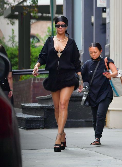 Rihanna Gives the Mini Skirt a Playful Twist | Vogue Rihanna Skirt Outfits, Mini Black Skirt Outfit, Mini Skirt Outfit Black Women, Mini Skirt And Sneakers, Stylist Aesthetic, Rihanna Sneakers, Amina Muaddi Heels, Leather Bralette, Suits And Sneakers