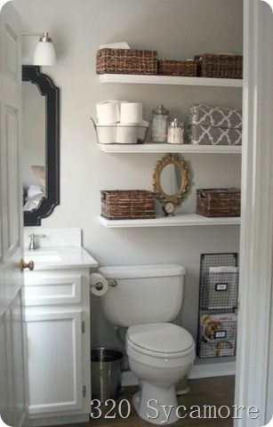 Shelves above toilet with baskets on them for bathroom storage in a tiny bathroom. Pretty Bathroom, Ny Apartment, Bad Inspiration, Small Bathroom Makeover, Decor Shabby Chic, Small Bathroom Storage, Bathroom Redo, Style At Home, Guest Bathroom