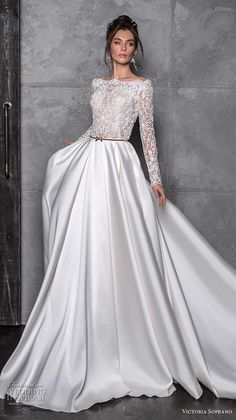 victoria soprano 2020 bridal long sleeves bateau neckline heavily embellished bodice satin skirt glamorous a line wedding dress covered lace back chapel train (7) mv -- Victoria Soprano 2020 Wedding Dresses | Wedding Inspirasi #wedding #weddings #bridal #weddingdress #weddingdresses #bride #fashion ~ White Long Sleeve Wedding Dress, Long Sleeve Wedding Dress Backless, Wedding Dress Cover, Long Sleeve Lace Top, Backless Lace Wedding Dress, Top Satin, Wedding Dress Lace, Trendy Wedding Dresses, Backless Wedding