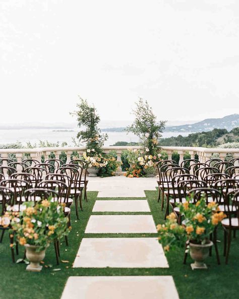 A Romantic, Italian-Inspired Wedding in Texas | Martha Stewart Weddings - The ceremony was set on the overlook with views of Lake Travis in the distance. The Southern Table created an Italian-inspired environment with arrangements of golden bougainvillea, several varieties of roses, peonies, and some other flora. #weddinginspiration #creativeweddingideas #weddingdecor Austin Texas Wedding Venues, Italian Wedding Venues, Modern Wedding Venue, Austin Wedding Venues, Austin Texas Wedding, Lake Travis, Tuscan Wedding, Wedding Venue Inspiration, Wedding Venues Texas